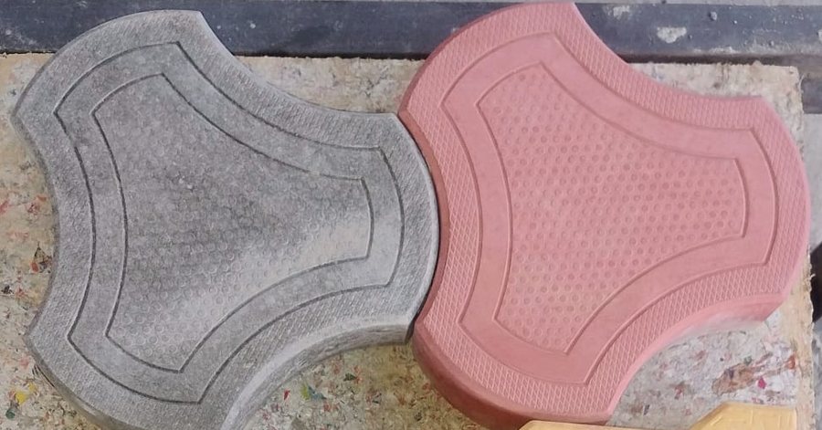 Grey and red cosmic-shape paver blocks made by SRT